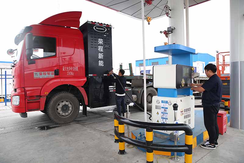 津門氫能重卡滿月,零碳環保成果登頂.jpg 津門氫能重卡滿月,零碳環保成果登頂.jpg